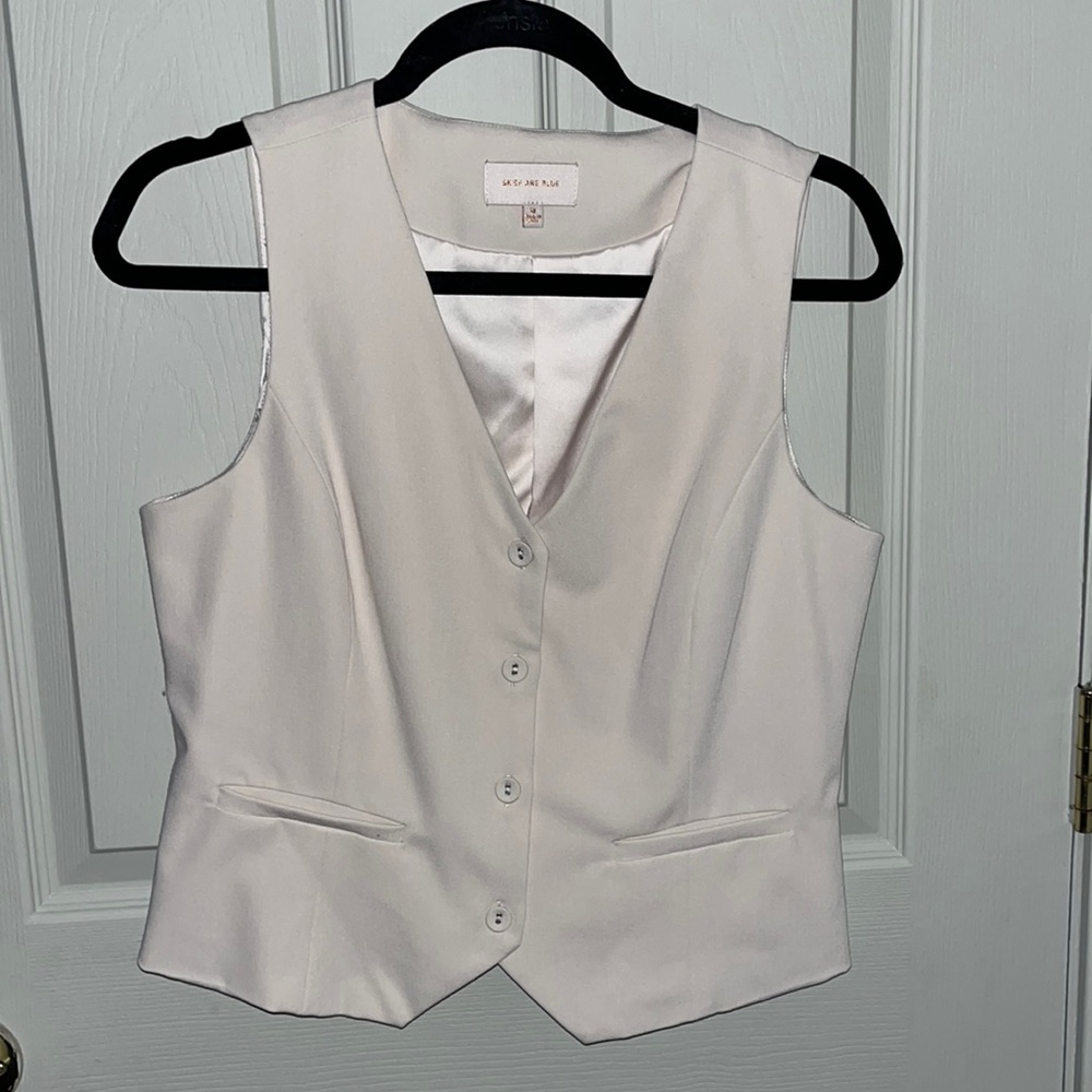 Skies are blue cream vest